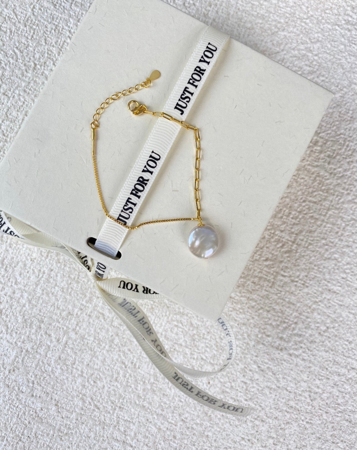 The Orbit Baroque Pearl Infinity Bracelet
