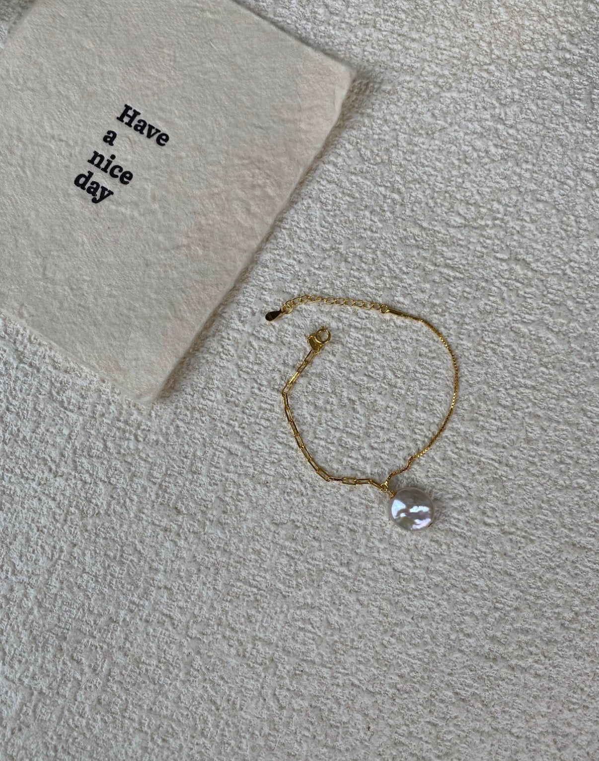 The Orbit Baroque Pearl Infinity Bracelet