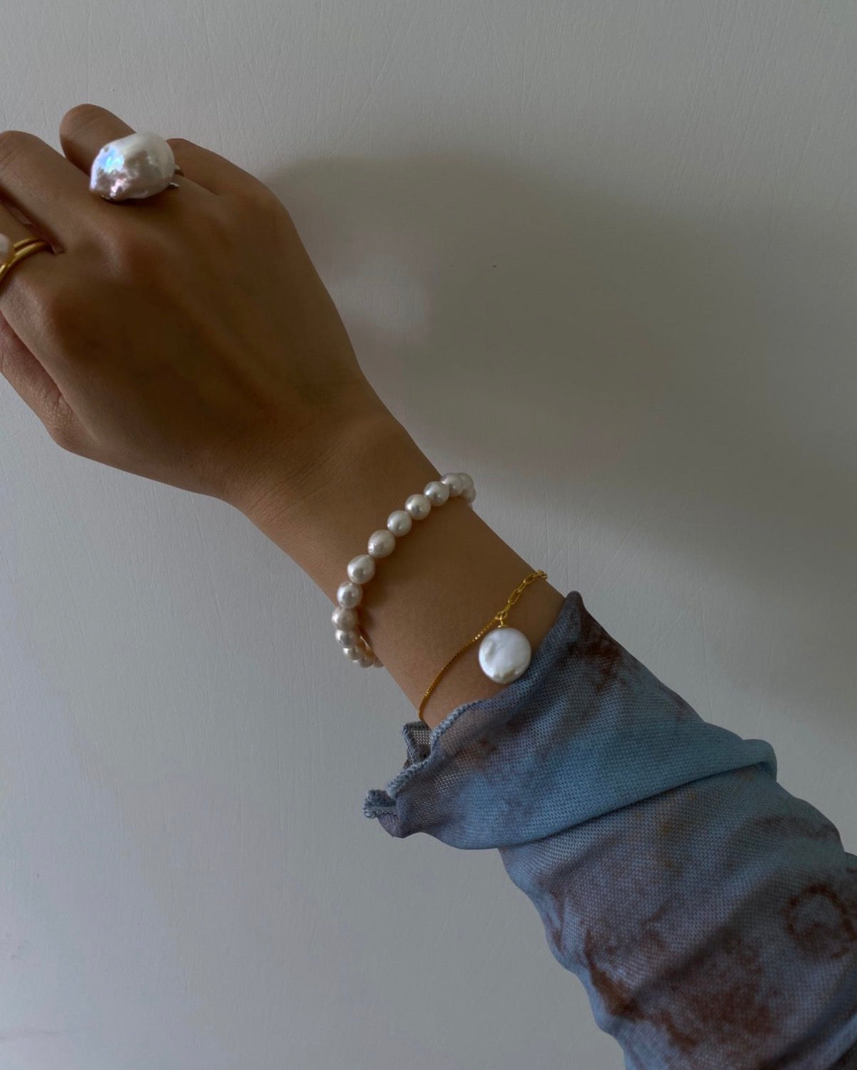 The Orbit Baroque Pearl Infinity Bracelet